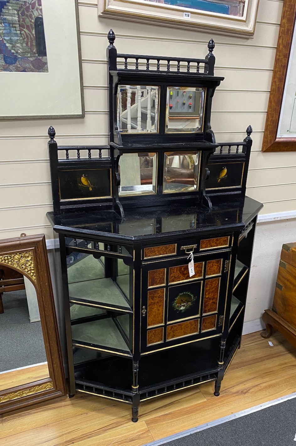 A late Victorian aesthetic movement ebonised and bird's eye maple mirror-back break front sideboard with inset painted panels of birds, width 106cm, depth 36cm, height 175cm